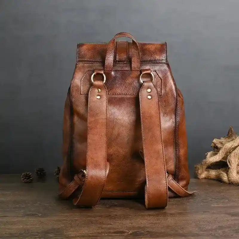 Cowhide Backpack — Style A — Shown in use; Back view; Strap details