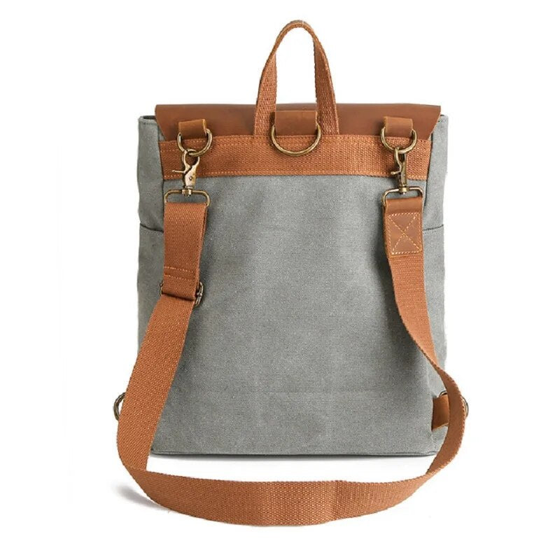 Mochila com detalhes em pele em lona encerada e pele — Modelo B