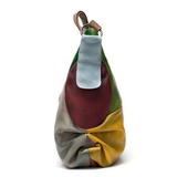 Bolsa de ombro em patchwork em pele bovina
