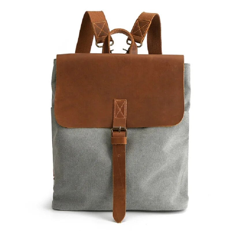 Mochila com detalhes em pele em lona encerada e pele — Modelo B