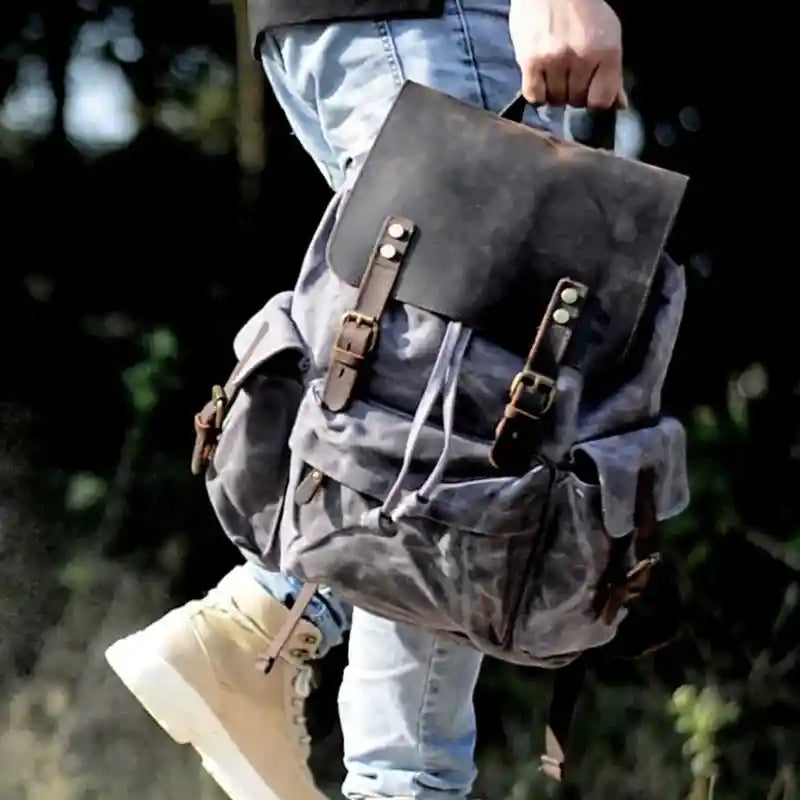Mochila com detalhes em pele em lona e pele — Modelo F