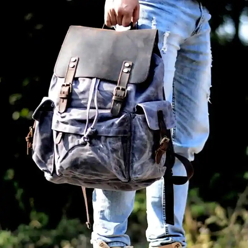 Mochila com detalhes em pele em lona e pele — Modelo F